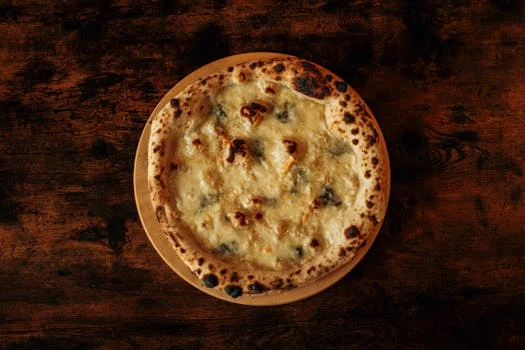 quattro stagioni pizza four seasons toppings